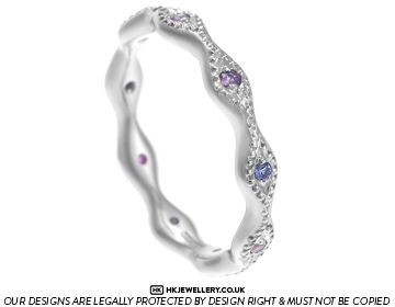 Olivia's marquise style eternity ring with pink, lilac and blue sapphires