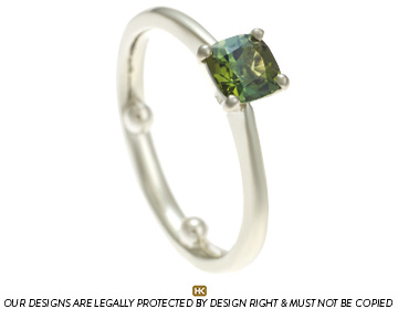 Ben and Marianne's green tourmaline and white gold eternity ring