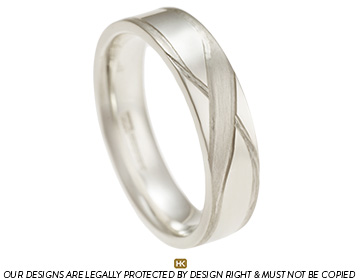 Stephen's white gold Mobius twist inspired wedding ring