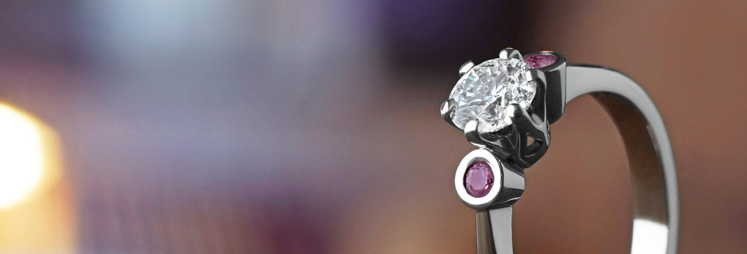 0.54ct H SI diamond and pink sapphire platinum engagement ring