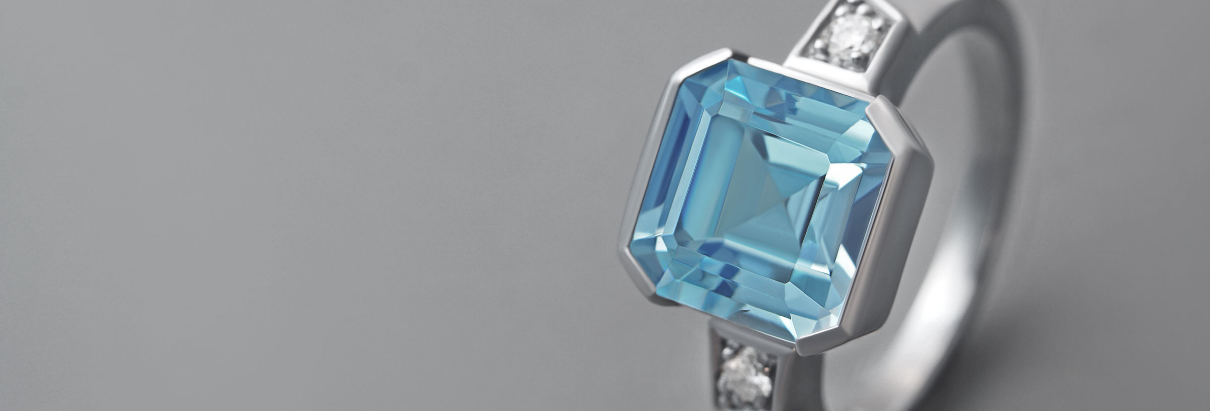 Swiss blue topaz, diamond and palladium art deco style engagement ring