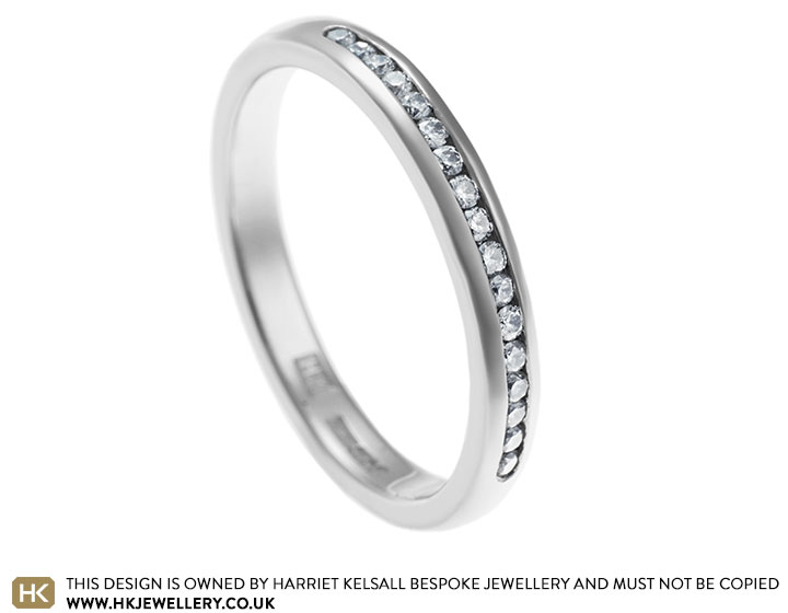 Delicate palladium and 0.16ct diamond half eternity ring