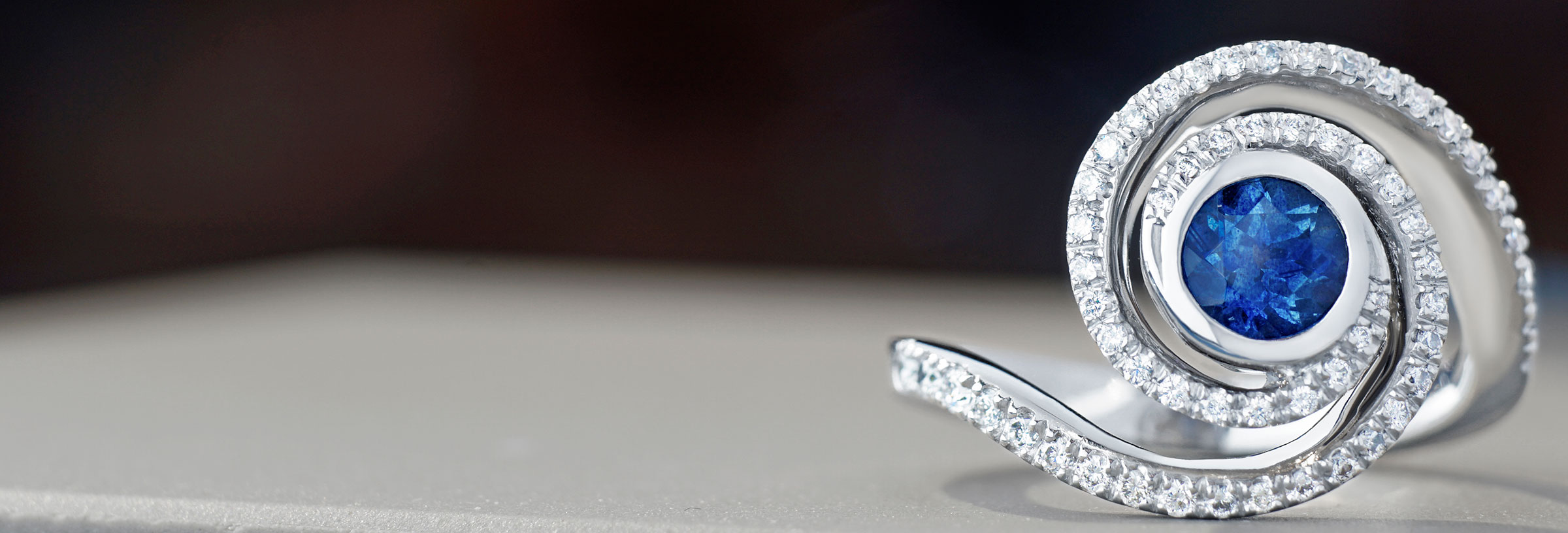 Milky way inspired platinum ring with sapphire diamonds