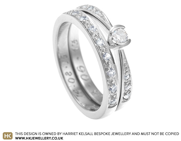 Kelly's pave set white sapphire palladium wedding ring