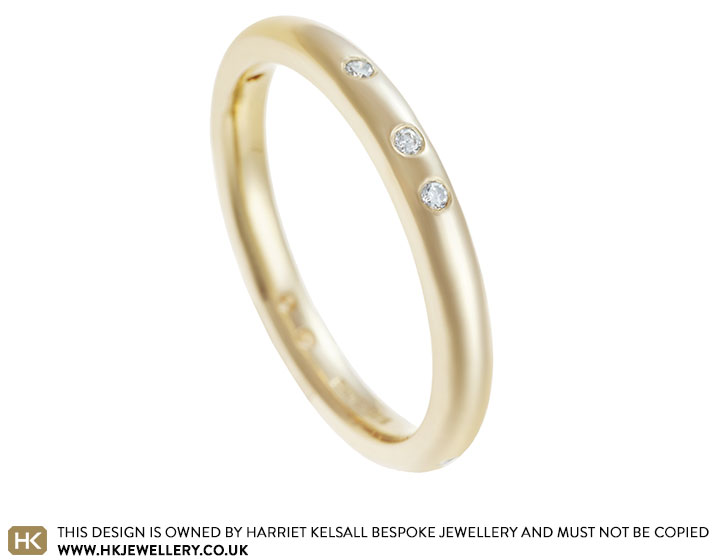 Charlotte's yellow gold and scattered diamond wedding ring