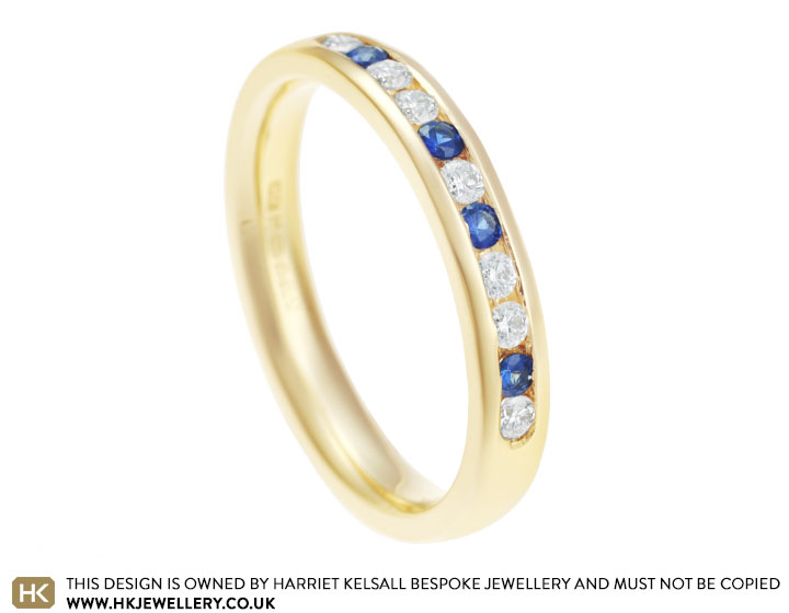 Jan's Fairtrade 18 carat yellow gold, diamond and sapphire eternity ring