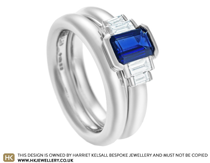 Suzie's 0.83ct emerald cut blue sapphire engagement ring