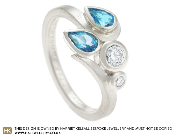 Karolina's pear cut London blue topaz and diamond engagement ring