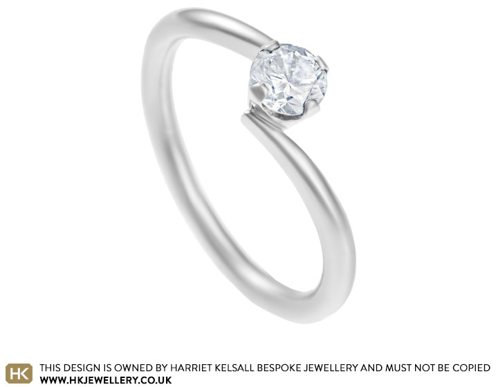 Hannah's platinum twist style engagement ring with a 0.37ct brilliant cut diamond