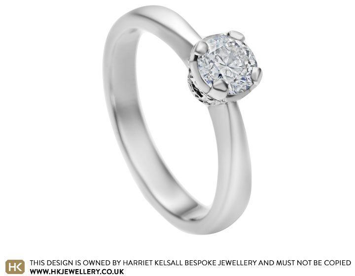 Platinum and 0.62ct diamond engagement ring