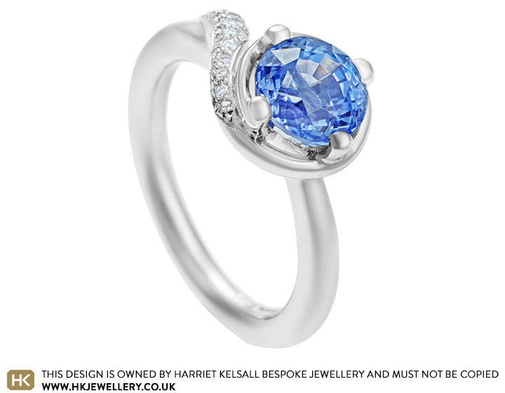 Spinning top inspired platinum ring with 2.24ct sapphire and diamonds totalling 0.21cts