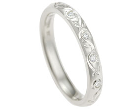 fairtrade-9ct-white-gold-diamond-and-floral-eternity-ring-13264_1.jpg