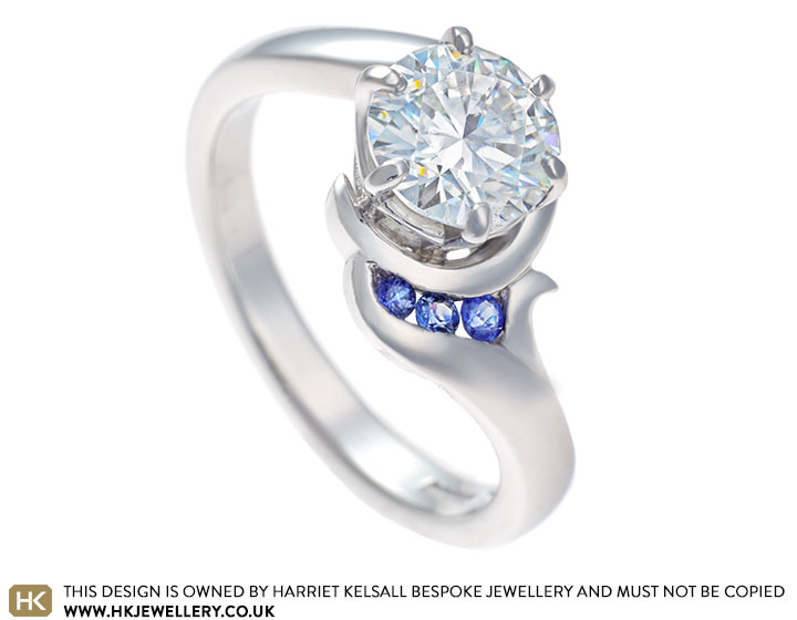 Catherin's wave inspired moisannite and sapphire engagement ring