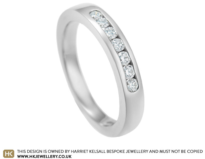 Platinum and 0.23ct diamond half eternity ring 