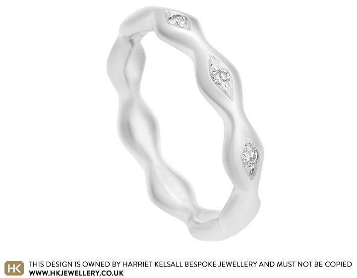 ripple-inspired-eternity-ring-with-five-grain-set-diamonds-13348_2.jpg