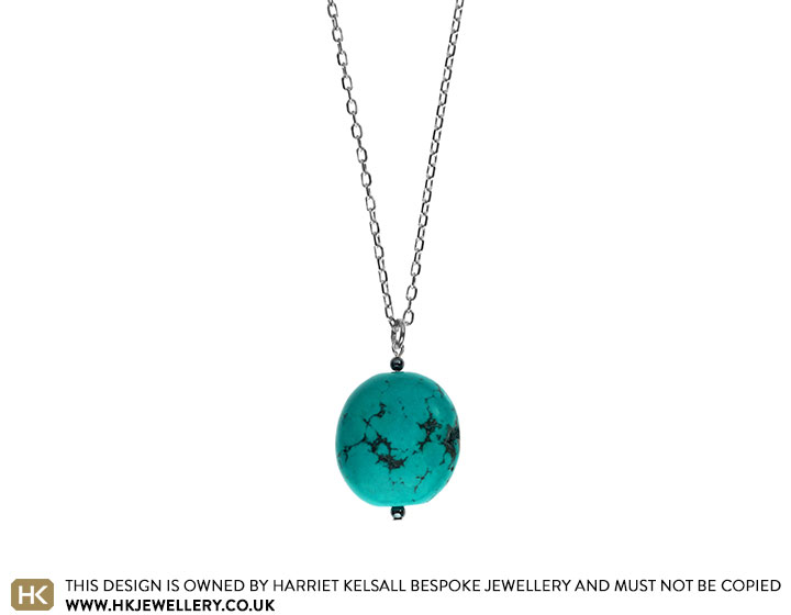 Turquoise and hematite on long Sterling silver chain