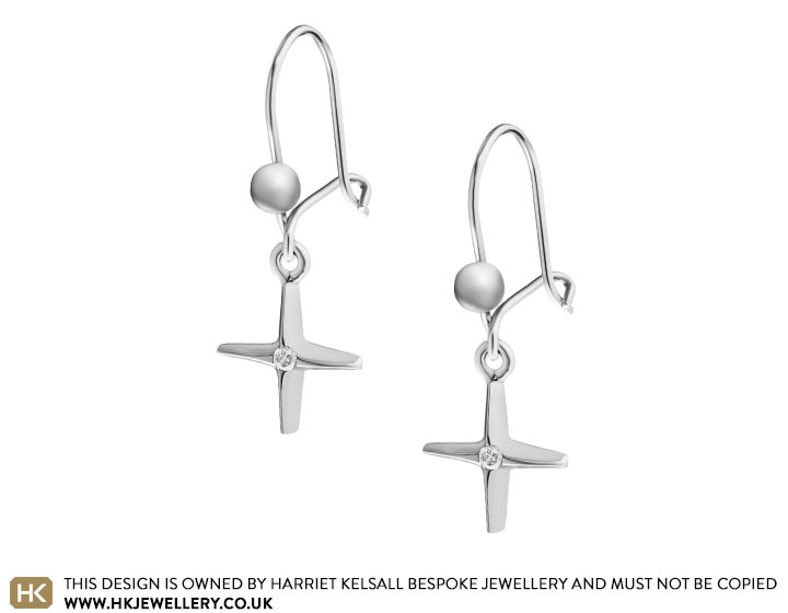 9 carat white gold star hook earings with invisibily set diamond