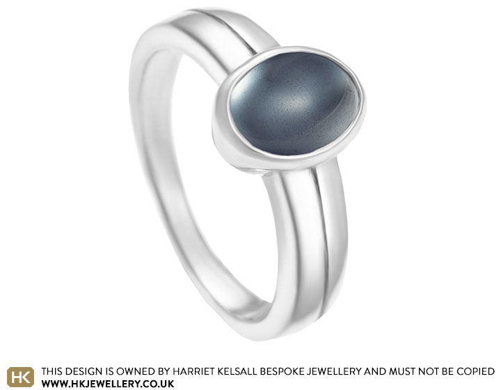 Sterling silver and blue goldstone dress ring