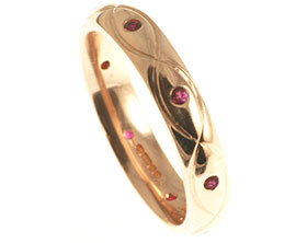 9ct-rose-gold-and-ruby-eternity-ring-with-celtic-engraving-2839_1.jpg