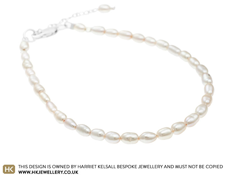 Sterling silver and ivory seed pearl one strand bracelet