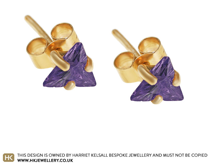 9 carat yellow gold stud earrings with purple cubic zircon