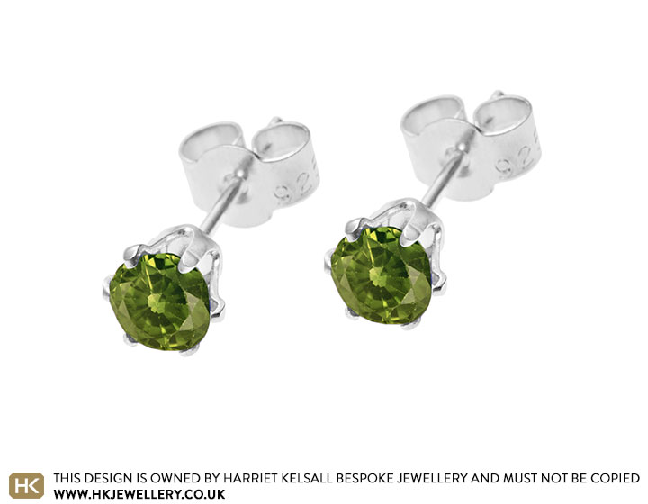 Sterling silver stud earrings claw set with faceted peridot