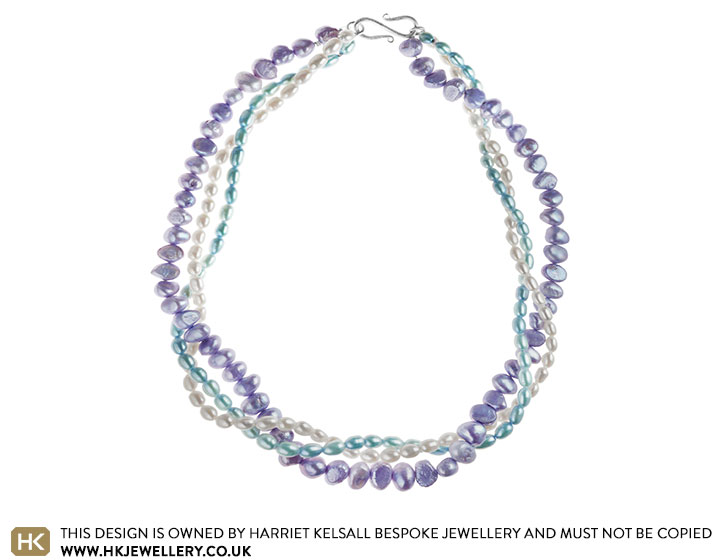 Triple strand blue, lilac and ivory pearl necklace