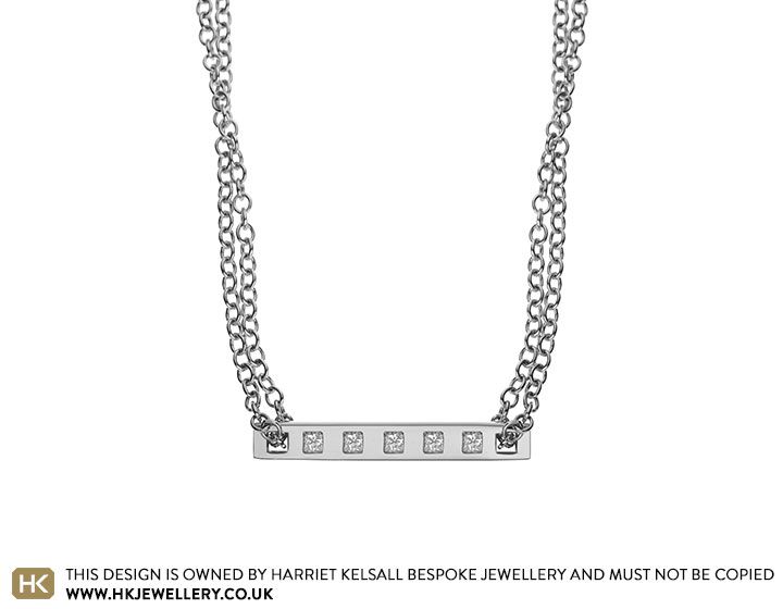 Rhodium plated 9 carat white gold necklace set with princess cut diamonds totalling 0.15ct