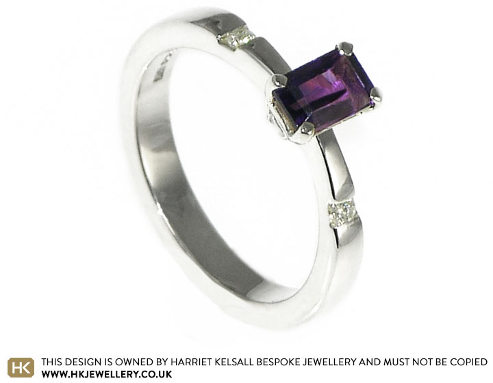 Art Deco inspired engagment ring with an emerald cut amethyst