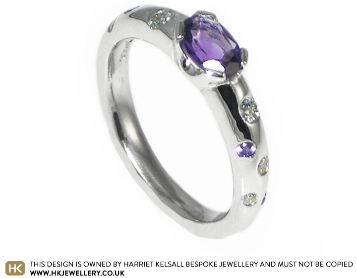 Stunning white gold engagement ring with central oval amethyst