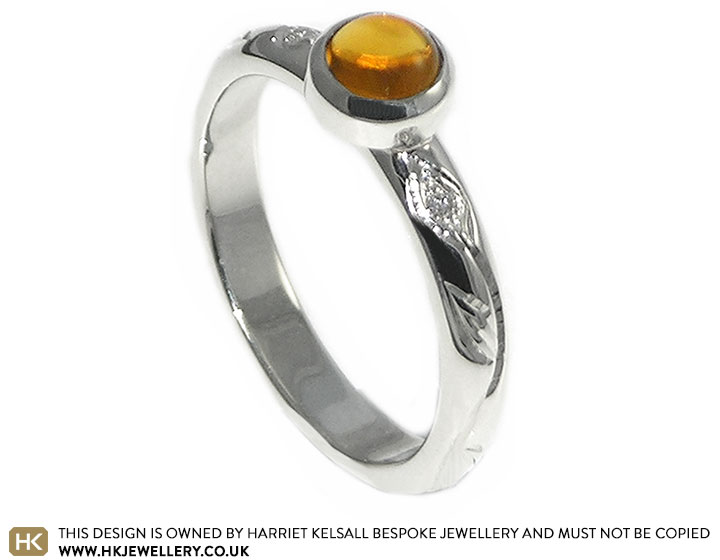 Vanessa's citrine engagement ring with leafy engraving