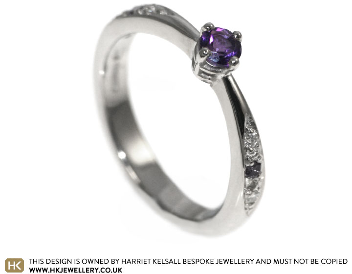 Beautiful amethyst and diamond engagement ring with shoulder stones