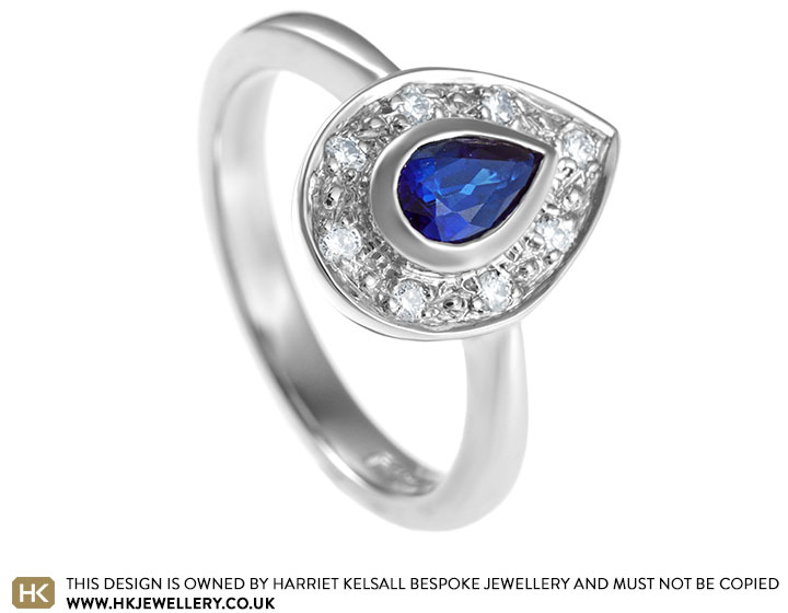 Kerry's palladium sapphire and diamond cluster engagement ring