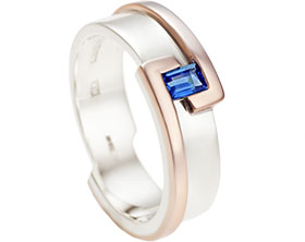 12712-Bespoke-9ct-white-gold-and-rose-gold-wedding-ring-holding-a-baguette-dark-blue-sapphire_1.jpg