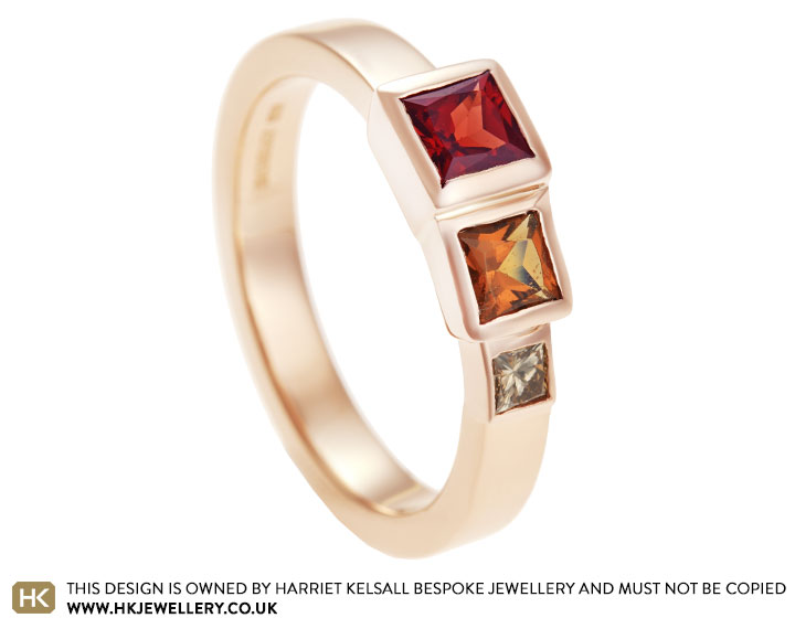 Vicky's 9 carat rose gold, garnet and diamond engagement ring