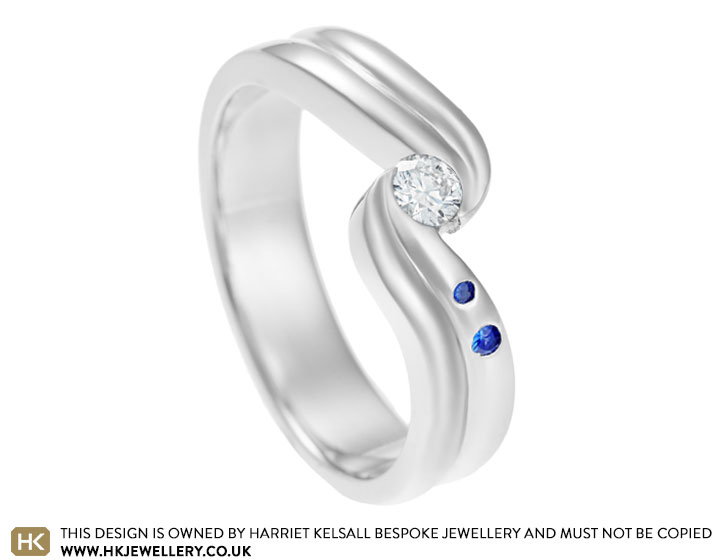 Nikki's 0.15ct diamond and sapphire twist engagement ring