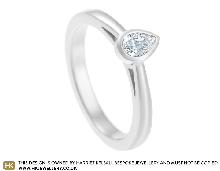 Joanna's palladium and 0.24ct pear cut diamond engagement ring