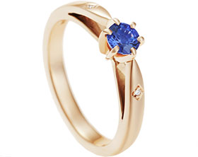 13034-9ct-rose-gold-engagement-ring-set-with-a-blue-sapphire-and-two-small-diamonds_1.jpg