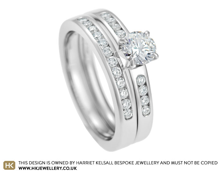 Joelle's bespoke platinum wedding ring with twelve channel set diamonds