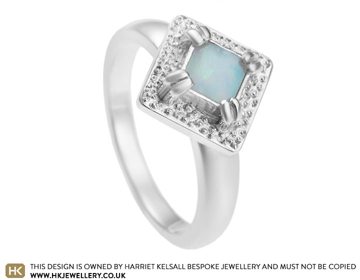 Sarah's cabochon white opal and Sterling silver engagement ring