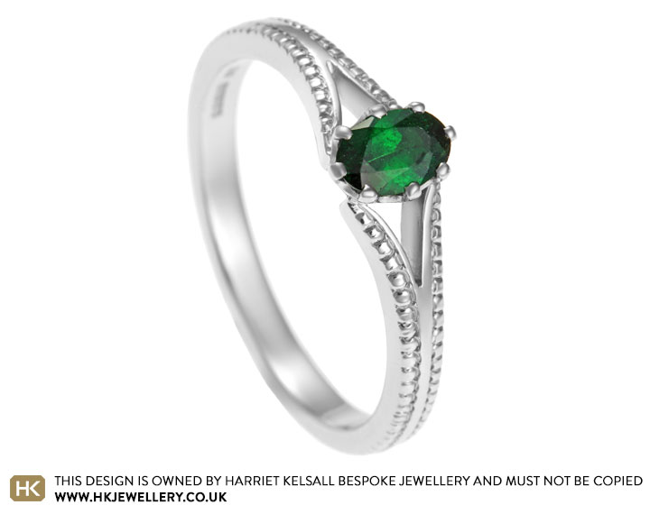 Jessica's palladium and oval cut tsavorite engagement ring