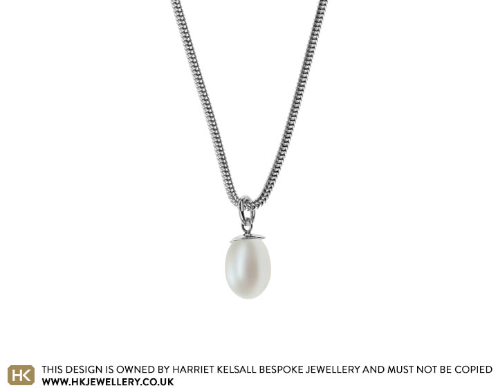 Drop shaped freshwater ivory pearl and sterling silver pendant