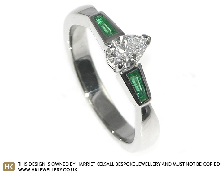 Ashley's palladium, diamond and emerald engagement ring 