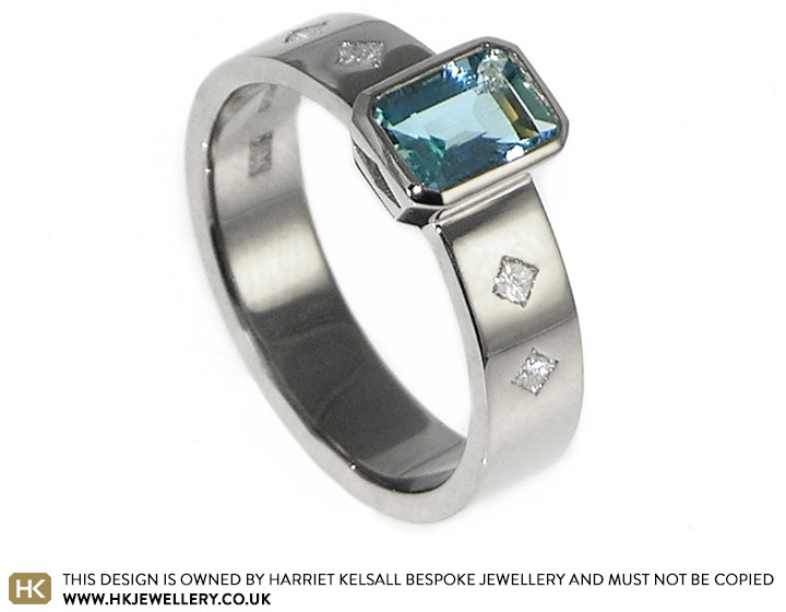 18ct white gold engagement ring with an emerald cut aquamarine