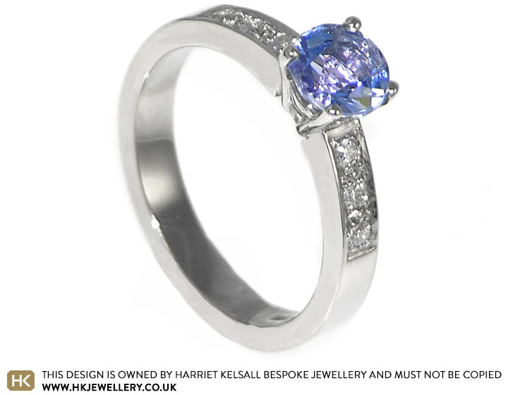 Jayne's engagement ring holding her own stunning tanzanite