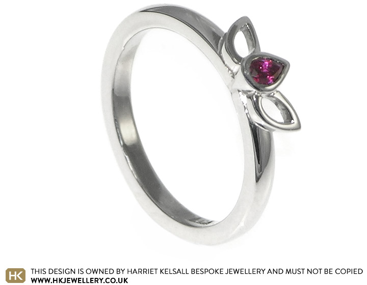 Iona's petal engagement ring with a beautiful ruby