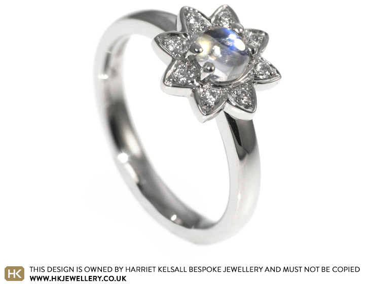 Striking 0.58ct moonstone, diamond and palladium engagement ring