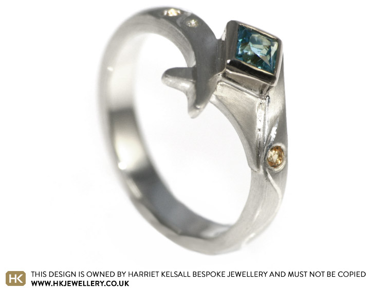 Unusual mixed metal and topaz engagement ring