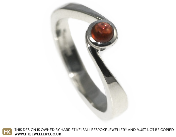 Kevin wanted a russet garnet and 9ct white gold engagement ring