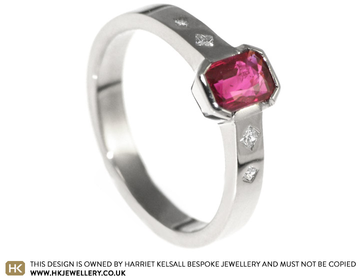 A unique 18ct white gold and scissor cut ruby engagement ring